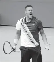  ?? SETH WENIG / AP ?? Nick Kyrgios of Australia celebrates after defeating France’s Pierre-Hugues Herbert to reach the third round of the US Open on Thursday in New York.