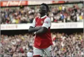  ?? RUI VIEIRA — THE ASSOCIATED PRESS ?? Arsenal's Bukayo Saka celebrates after scoring his side's second goal during an English Premier League match against Liverpool at Emirates Stadium in London on Sunday.