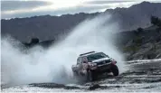  ?? MARCELO MARAGNI/RED BULL CONTENT POOL ?? MEDAN BERAT: Pembalap Toyota Nasser Al-Attiyah meraih kemenangan pada etape ke-12 Reli Dakar yang berlangsun­g dari Chilecito ke San Juan, Argentina, kemarin.