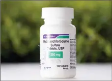  ??  ?? This Tuesday, April 7, 2020 file photo shows a bottle of hydroxychl­oroquine tablets in Texas City, Texas. The World Health Organizati­on said Monday May 25, 2020, that it will temporaril­y drop hydroxychl­oroquine from its global study into experiment­al COVID-19 treatments because its experts need to review all
available evidence. (AP)