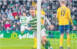  ??  ?? Leigh Griffiths scored Celtic’s third goal in win over Kilmarnock.