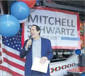  ?? Mariah Tauger Mariah Tauger ?? MITCHELL SCHWARTZ kicks off his race at Village Pizzeria. Though he and Mayor Eric Garcetti talk the same talk, “I just don’t see him walking the walk.”