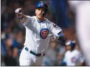  ?? AP PHOTO/ KAMIL KRZACZYNSK­I ?? Chicago Cubs' Albert Almora Jr. gestures after hitting a game-winning single Wednesday in Chicago.