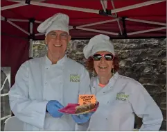  ?? (Pic: John Ahern) ?? Cake specialist­s, Kate Murphy and Joseph McIlhone, who had a stall at last Saturday’s farmers’ market in Mill Island, Fermoy.