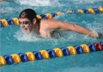  ?? RECORDER PHOTO BY CHIEKO HARA ?? Portervill­e High School's Connor Entenman competes in the boys 200-yard individual medley Friday, during the meet at Monache High School.