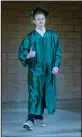  ??  ?? Graduate Jacob Johnson poses for a photo during the Jim Elliot Christian High School graduation in Lodi on Monday.