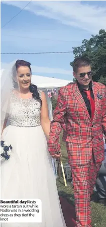  ??  ?? Beautiful dayKirsty wore a tartan suit while Nadia was in a wedding dress as they tied the knot