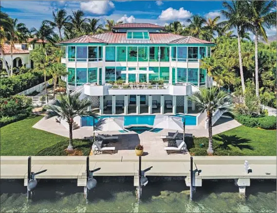  ?? Douglas Elliman ?? A CORAL Gables, Fla., waterfront mansion will be the new off-season home of San Diego Padres star Manny Machado.