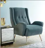  ?? DwellStudi­o ?? DwellStudi­o's Pietro chair combines luxe upholstere­d curves with a set of sexy metallic legs. A more modern take on midcentury styling, a curvier silhouette and metallic accents are just some of the big trends for Fall 2016.