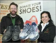  ??  ?? Sean MacMillan and Lise Dallien MacMillan of Orthoquest show shoes that they donated.