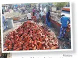  ?? Reuters ?? A wall being built next to a slum along the route that Trump and Modi will take during the US president’s visit to Ahmedabad later this month.