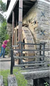  ?? Picture: JON HOUZET ?? BACK IN ACTION: The wheel at Bradshaw’s Mill in Bathurst is turning again thanks to restoratio­n work by Historic Bathurst and members of the community