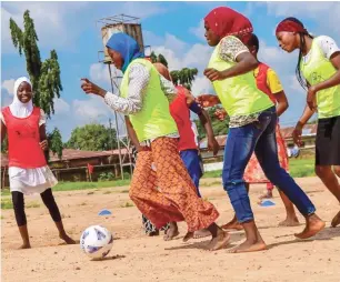  ??  ?? Young girls compete for ball possession in one of the matches during the FIFA Foundation and YEDI SKILLZ Holiday Camp in Zuba