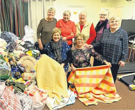  ??  ?? A CHARITY appeal by Tayside Deaf Hub for help for Romanian dogs in need has been a big success.
The Cause for Paws appeal set up by Patricia Mill, who was helped by Doreen Campbell, has seen people donate blankets, food, toys and towels.
Patricia...
