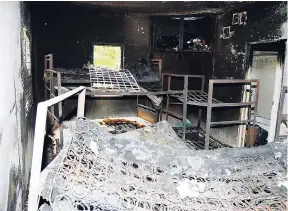  ?? FILE ?? The burnt-out room at the Armadale Juvenile Correction­al Centre in St Ann where five wards were killed in 2009. Two others succumbed to injuries shortly after.