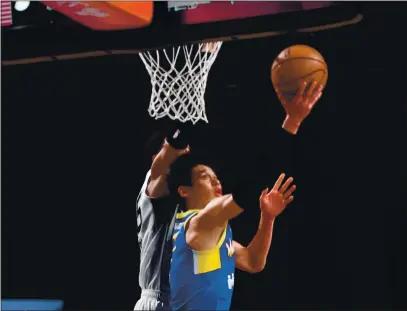  ?? PHOTOS BY JUAN OCAMPO – NBAE ?? Guard Jeremy Lin drives in the Santa Cruz Warriors’ win over Austin in the teams’ NBA G League game at AdventHeal­th Arena in Orlando.