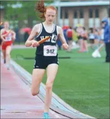  ?? MICHAEL REEVES — FOR DIGITAL FIRST MEDIA ?? Strath Haven’s Grace Forbes finishes up her anchor leg in the 4 x 800 meter relay. On a triple-medal day for Forbes, she crossed first easily here as she and Panthers teammates Maggie Forbes, Taylor Barkdoll and Abby Loiselle took district gold.