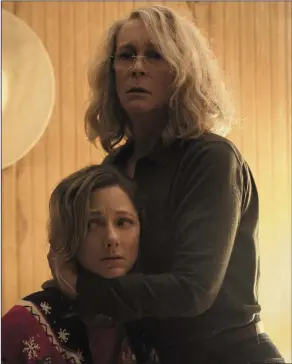  ??  ?? Judy Greer as Karen and Jamie Lee Curtis as Laurie Strode in Halloween.