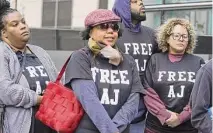  ?? Elizabeth Conley/Staff photograph­er ?? Supporters of Antonio Armstrong Jr. gather Monday outside the Harris County Criminal Justice Center in Houston.