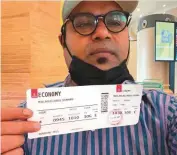  ??  ?? ■ Abdul Rahman who flew in from Kochi yesterday morning shows his boarding pass.