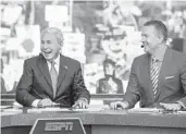  ?? PATRICK CONNOLLY/ORLANDO SENTINEL ?? College GameDay hosts Lee Corso and Kirk Herbstreit at UCF on Saturday ahead of the Knights’ big game against Cincinnati.