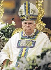  ?? ANDREW MEDICHINI / ASSOCIATED PRESS 2010 ?? Cardinal Bernard Law celebrates Mass in St. Mary Major’s Basilica in Rome in August 2010. Law, who as archbishop of Boston was accused of protecting abusive priests, died Wednesday.