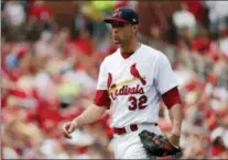  ?? JEFF ROBERSON — THE ASSOCIATED PRESS ?? Cardinals starting pitcher Jack Flaherty walks off the field during the sixth inning Sunday in St. Louis.