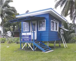  ??  ?? The customs office in the port of Avarua on Rarotonga is suggestive of the small-is-beautiful way of life.