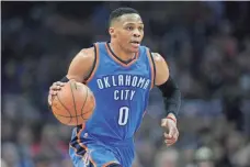  ??  ?? Russell Westbrook is averaging a triple-double, but fans moved Stephen Curry ahead of him in All-Star voting. GARY A. VASQUEZ, USA TODAY SPORTS
