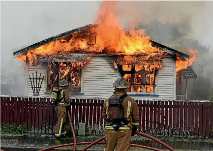  ?? PHOTO: FIRE AND EMERGENCY ?? A house was engulfed in flames as part of a firefighti­ng training exercise in Palmerston North.