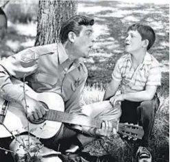  ?? CBS ?? Andy Griffith, left, played father Andy Taylor to Ron Howard’s “Opie” Taylor on “The Andy Griffith Show.”