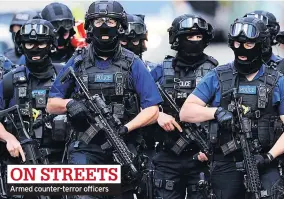  ??  ?? Armed counter-terror officers ON STREETS LEADER Mr Corbyn campaigns yesterday