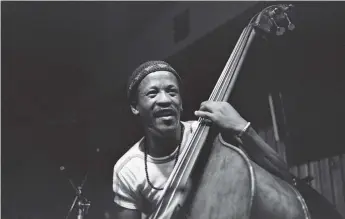  ?? ?? Bassist Johnny Dyani performs in Copenhagen, Denmark, in 1976. Almost his entire career was spent in exile. Photo: Ib Skovgaard/JP Jazz Archive/Getty Images