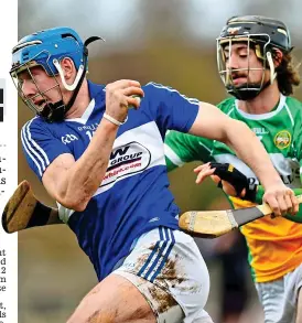  ??  ?? On the charge: Stephen Maher of Laois gets away from Offaly’s Shane Kinsella at St Brendan’s Park SPORTSFILE