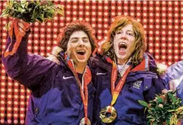  ?? GREG BAKER AP ?? Gold medalist Shaun White (right) and silver medalist Daniel Kass during the medal ceremony for the men’s halfpipe at the 2006 Olympics in Turin, Italy.