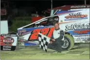  ?? SUBMITTED PHOTO - RICH KEPNER ?? Barto’s Ryan Beltz celebrates in victory lane after his first career win on May 28 at Grandview.