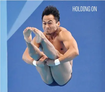  ?? Picture: AFP ?? India’s Ramananda Sharma Kongbraila­tpam competes in the men’s 1m springboar­d preliminar­y diving event during the Asian Games in Jakarta this week.