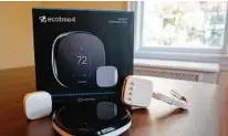  ?? Cathy Bussewitz / Associated Press ?? An Ecobee smart thermostat and room sensor are on display in New York.