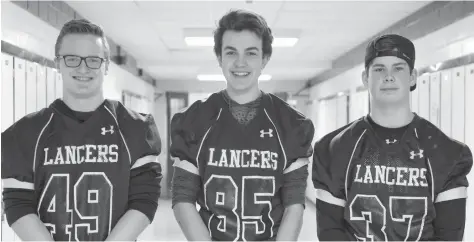  ?? [WHITNEY NEILSON / THE OBSERVER] ?? Junior Elmira District Secondary School football players Colby Van Bargan, Jake Gingrich and DJ Campbell are hoping to play for the Waterloo Predators this summer to prepare for high school football in the fall.