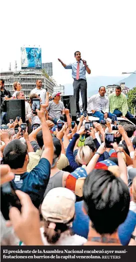  ?? REUTERS ?? El presidente de la Asamblea Nacional encabezó ayer manifestac­iones en barrios de la capital venezolana.