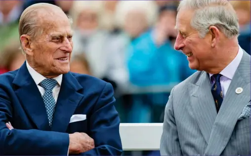  ??  ?? Father and son: Prince Philip and Charles had a close relationsh­ip and were in contact right up to his death