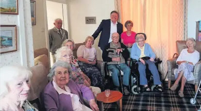  ??  ?? Questions MP Stephen Kerr with some of the Abbeyfield residents