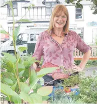  ??  ?? Blooming marvellous Lorna Cunningham of Blairgowri­e-based Flourish Plants