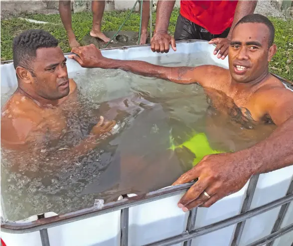  ?? Photo: ?? Nadi rugby reps Jo Radrodro and captain Jolame Luvevou cool down after gruelling training session at Prince Charles Park, Nadi.
Waisea Nasokia