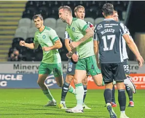  ?? SNS. ?? Shane Duffy turns away after grabbing Celtic’s leveller in Paisley.