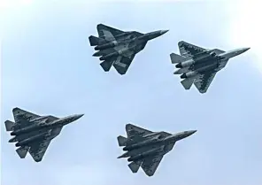  ?? XINHUA ?? Yes, it’s not a bird Su-57 fighter jets on the internatio­nal aviation and space salon MAKS 2019 in Zhukovsky, Russia.The air show kicked off on Tuesday.