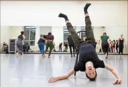  ?? Steph Chambers/Post-Gazette ?? Point Park University freshman Matthew Saggiomo rehearses with the Conservato­ry Dance Company on Tuesday at the GRW Dance Complex, Downtown.