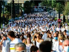  ?? (Caroline Blumberg/EPA) ?? Thousands participat­e in a march as a tribute to Philippe Monguillot in Bayonne