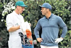  ??  ?? Team work: Paul Casey and caddie John Mclaren at practice this week