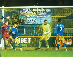  ?? PIC: Ian Burt ?? HOT SHOTS: Aldershot Town grab their later winner through Alfie Wittingham